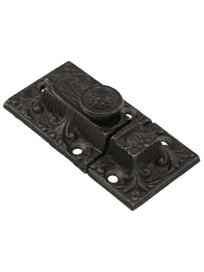 Late Victorian Cast-Iron Decorative Cabinet Slide Latch in Antique Iron.